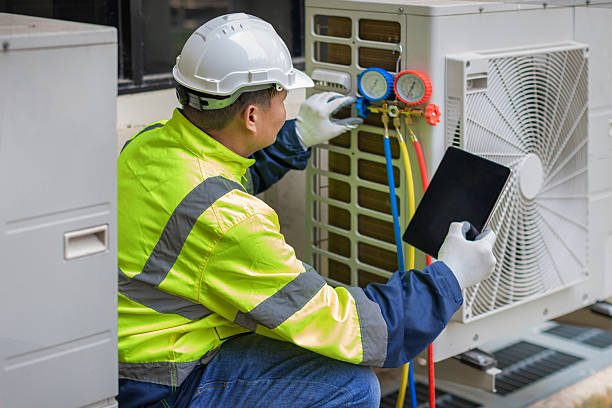 Professional Heat Pump Repair technician working in North Granville, NY